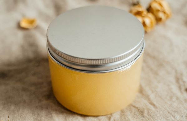 pot of oatmeal and honey body scrub