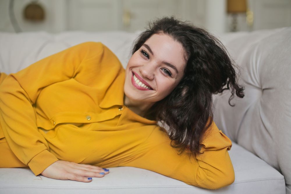 women using natural toothpaste