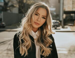Lady who has used thermal ceramic rollers to create perfect curls